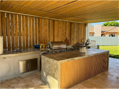 Luxury outdoor kitchen with stone countertops
