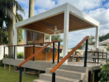 Modern white pergola with outdoor seating
